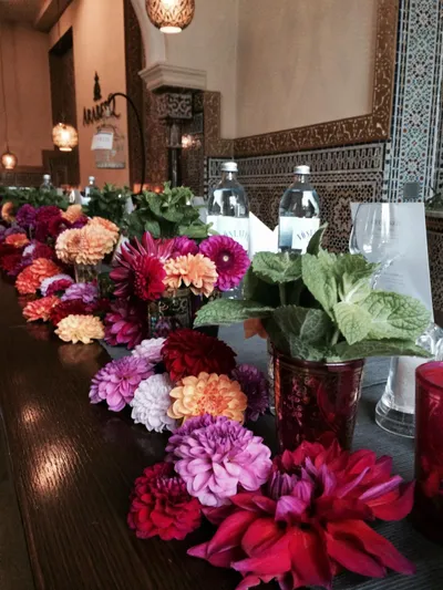Floral decoration on a festively set table at ArabesQ